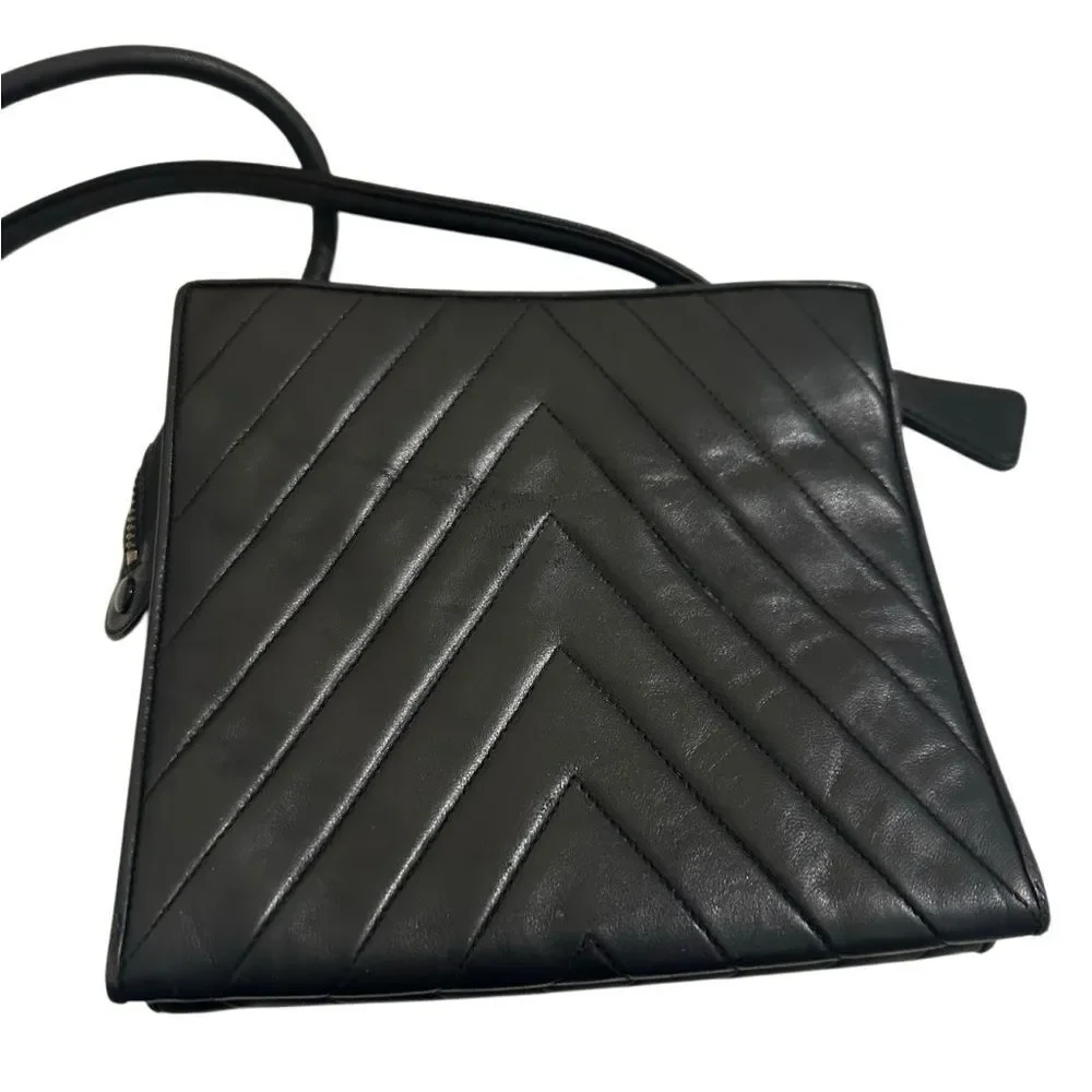 CHANEL Black Chevron Leather Shoulder Bag with Gold Accent